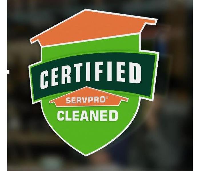 Certified: SERVPRO Cleaned shield orange and green